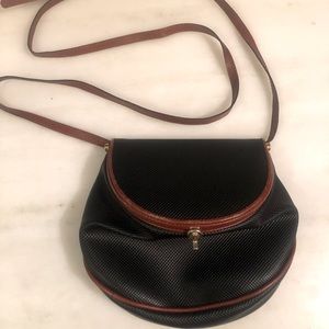 Black Marco Polo coated canvas vintage Bottega Veneta crossbody bag.